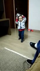 Child Runs Into Wall With a Bucket on His Head