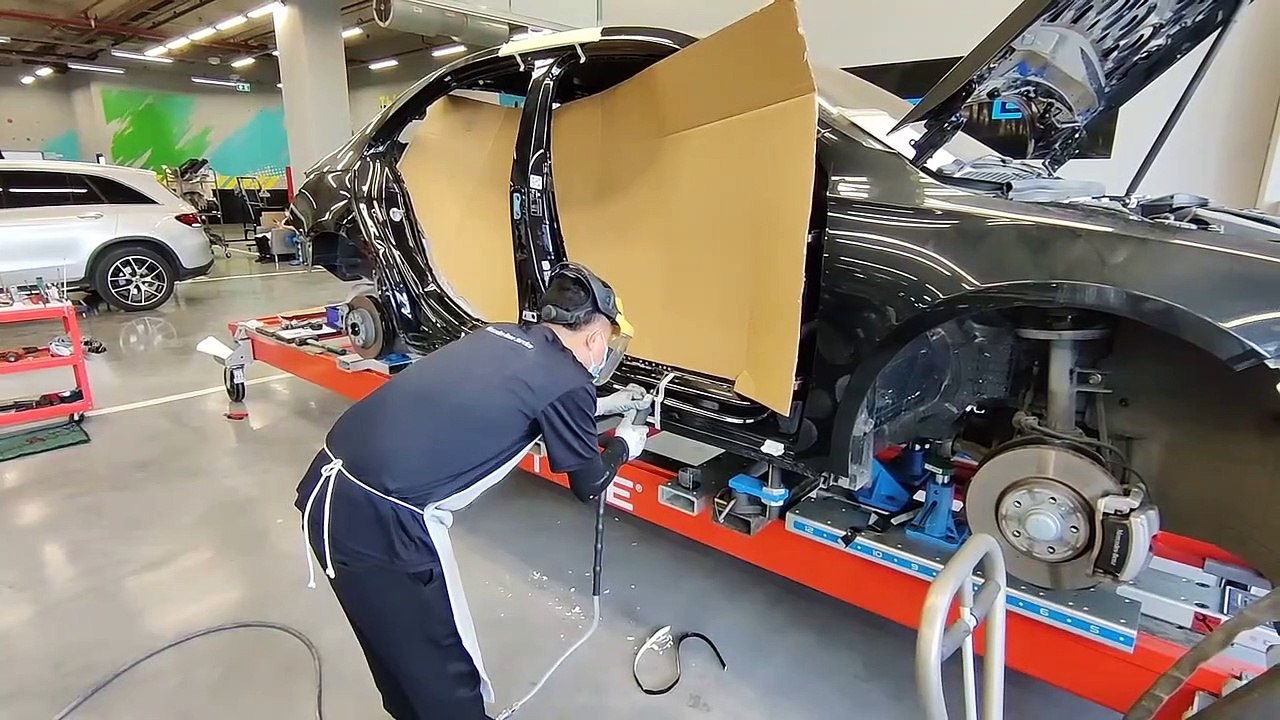 B-pillar replacement - Mercedes-Benz structural repair on Celette bench with side gantry