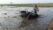 How to Cultivate soil by tractor in village
