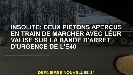 Inhabituel: deux piétons vus marcher avec leur valise sur le groupe d'arrêt d'urgence E40