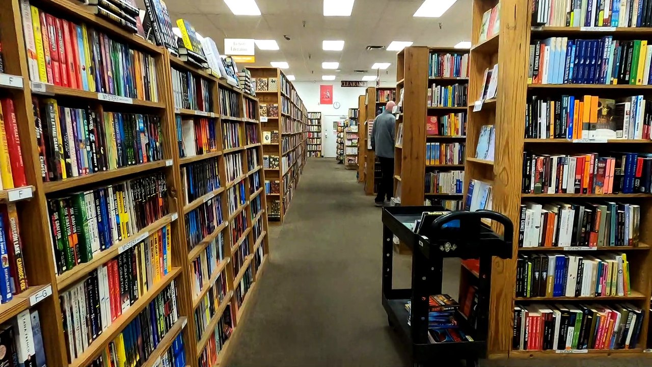 Walking through a used bookstore