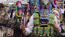 WATCH: Bulgarian folk performers dress in vibrant costumes for masked festival
