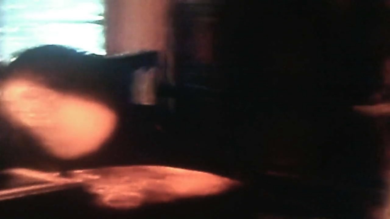 Jonathan playing the wii while Christopher & Anthony watch