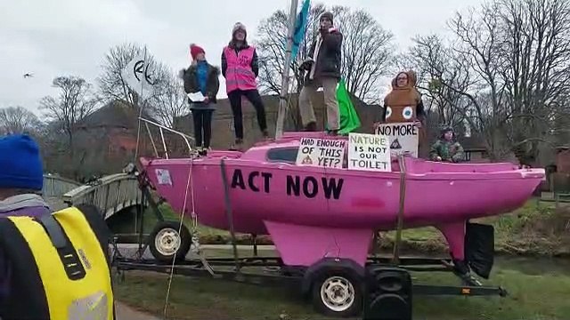 Extinction Rebellion protesters call for action on for river pollution in Gostrey Meadow, Farnham