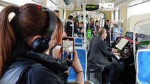 Classical musicians play to tramway riders in Nantes