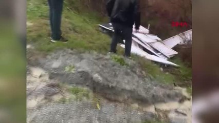 CUMHURBAŞKANI ERDOĞAN'IN AFİŞLERİ DEREYE ATILDI