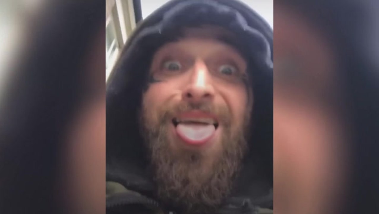 ‘I’m back again’: Wanted man taunts cops by filming himself outside police stations
