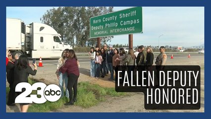 Fallen deputy honored with highway sign