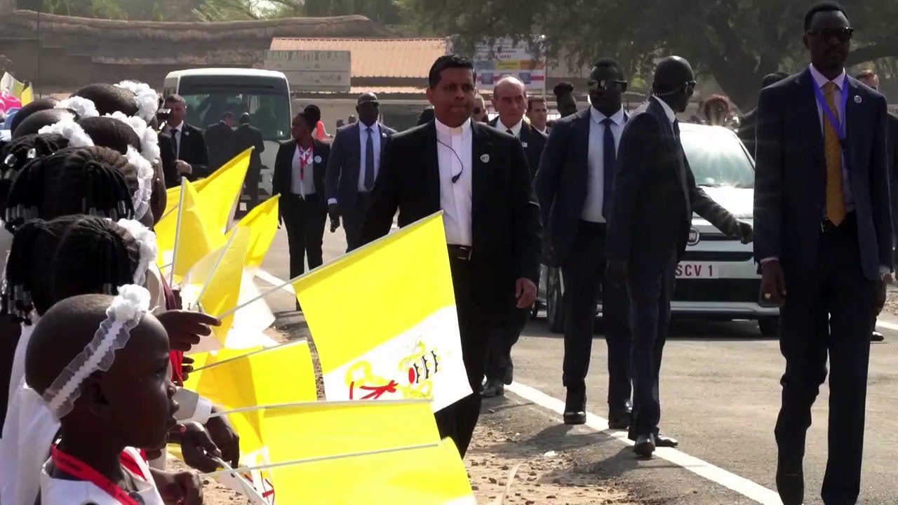 WATCH: Pope visits church in South Sudan packed with people holding up signs for peace