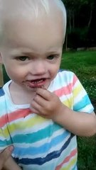 Little Boy Eats a Worm