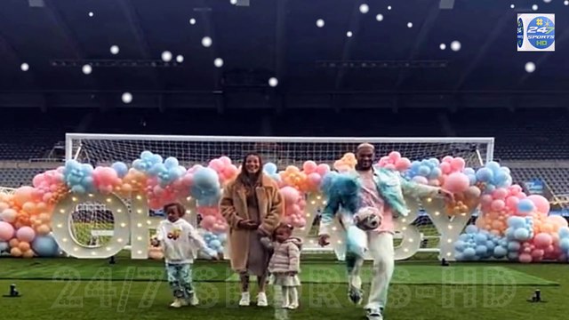 Newcastle midfielder Joelinton holds his gender reveal on the pitch at St James' Park with partner Thays Gondim and their two children... as the couple discover they are having a baby boy in a heartwarming clip