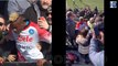 Napoli star Victor Osimhen climbs into the CROWD to apologise to a young fan after unintentionally hitting her during his warm-up against Spezia - but struggles to get back on the pitch as fans surround