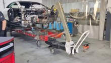 Mercedes S Coupe front rail and strut tower replacement on Celette bench with Universal Jigs