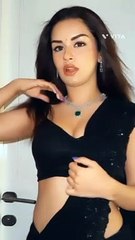 Avneet was seen wearing a black embellished saree