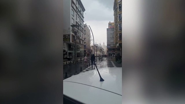 Watch the moment bystanders sent running for their lives as building in Sanliurfa collapses
