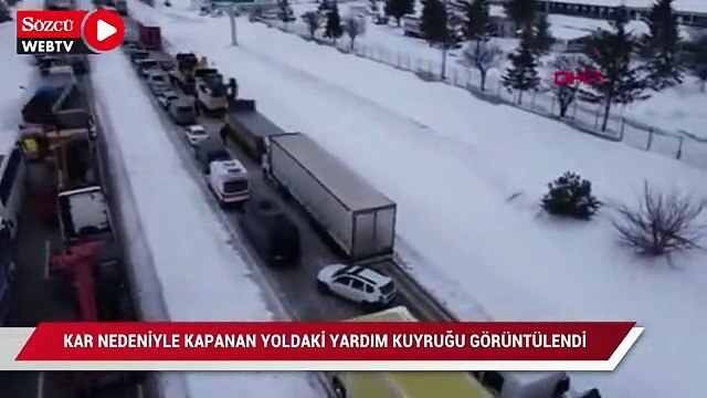 Kar nedeniyle kapanan yoldaki yardım kuyruğu havadan görüntülendi