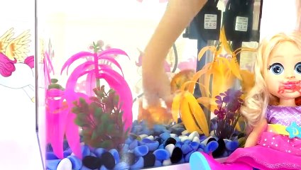 Diana pretends to be a mermaid and wears a full mermaid princess costume