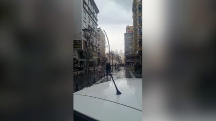 Watch the moment bystanders sent running for their lives as building in Sanliurfa collapses