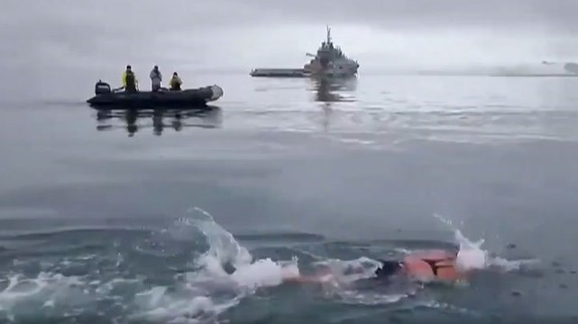 ‘Ice mermaid’ swimmer breaks two world records completing swim in Antarctic