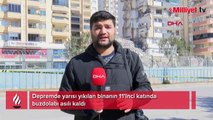 Yarısı yıkılan binanın 11'inci katında buzdolabı asılı kaldı