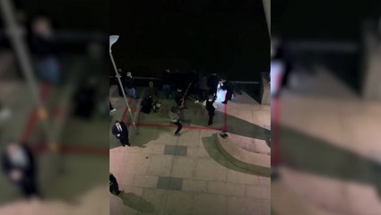 Two men dive into Canary Wharf dock to rescue woman
