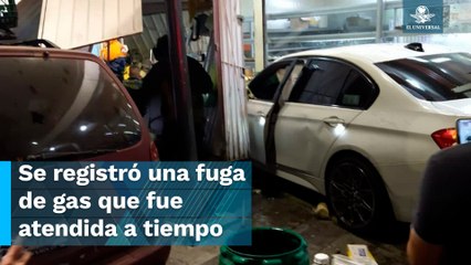 Choca su BMW contra puesto de tacos en Venustiano Carranza