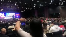 Inside the Belle Salle, Japan OFWs are excited to meet President Marcos