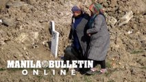 Hundreds of unidentified victims from Turkey's quake buried in mass grave