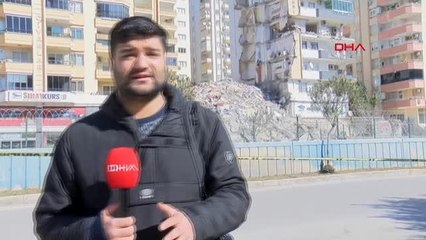 YARISI YIKILAN BİNANIN 11'İNCİ KATINDA BUZDOLABI ASILI KALDI