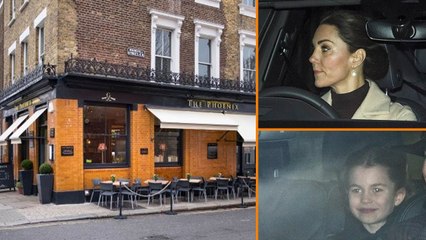 Kate Middleton enters the pub with Princess Charlotte