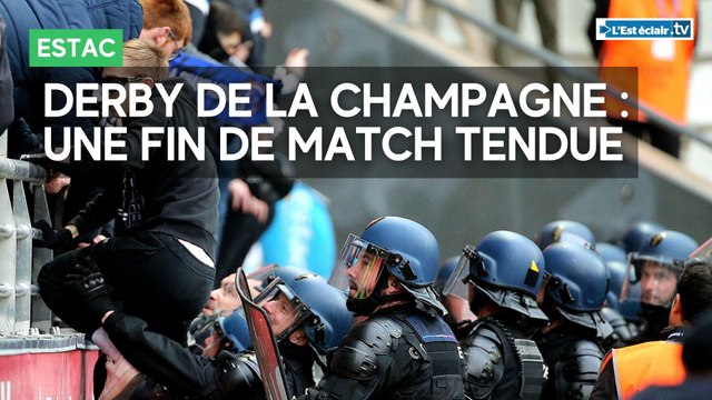 Stade de Reims v Estac : des joueurs tentent d'envahir le terrain