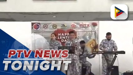 PCG band serenades, gives flowers to PNR passengers on Valentine’s Day