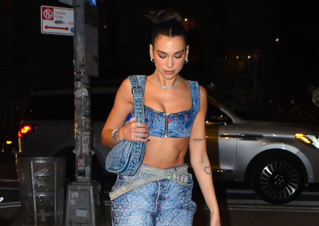 Dua Lipa's Canadian Tuxedo Included a Knee Length Skirt and the Slouchiest Jean Jacket