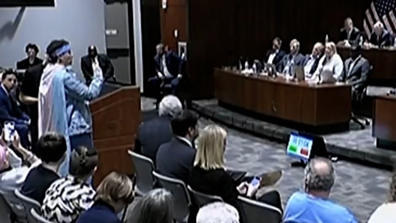 Florida trans protester injects testosterone in front of health board