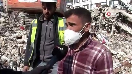 Binanın altında kalmaktan son anda kurtuldu