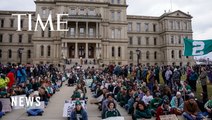 Hundreds Protest for Tougher Gun Laws After Michigan State Mass Shooting