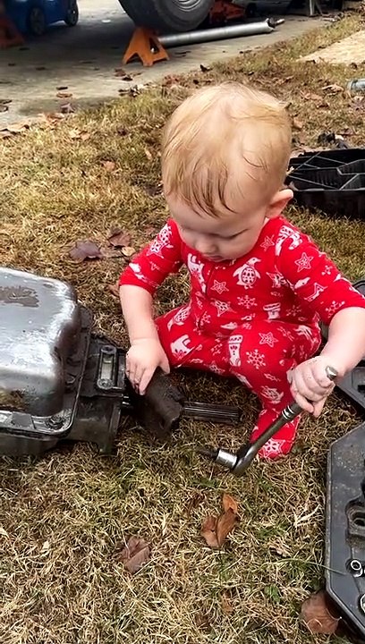 Toddler Uses a Wrench