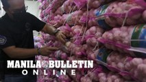 BOC raids in 24 Manila, Malabon warehouses yield P150M worth of ‘smuggled’ onions, garlic