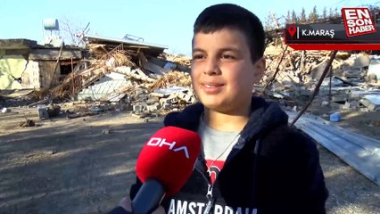 Kahramanmaraş'ta köpeği enkazdan çıkmasına yardım etti