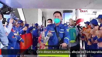 Çin'e dönen kurtarma ekibi, alkışlar ve Türk bayraklarıyla karşılandı