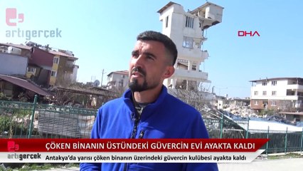 Yarısı çöken binanın üstündeki güvercin evi ayakta kaldı