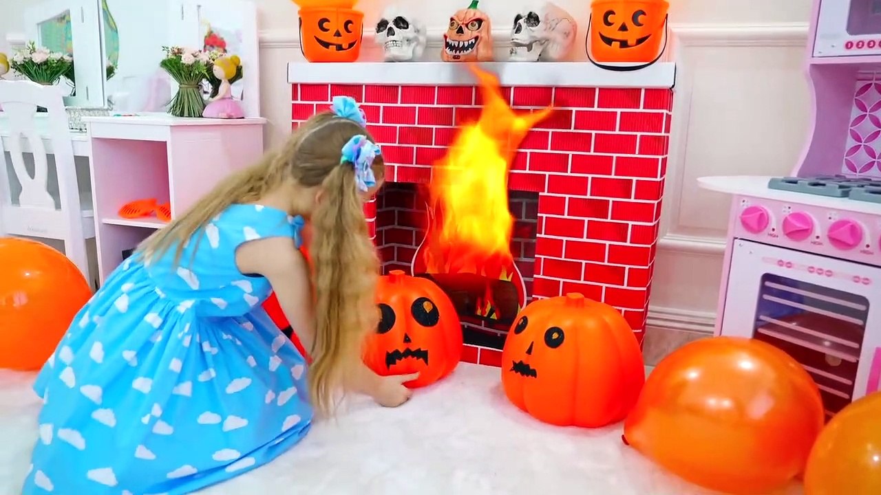 Diana and Roma decorate the room for Halloween