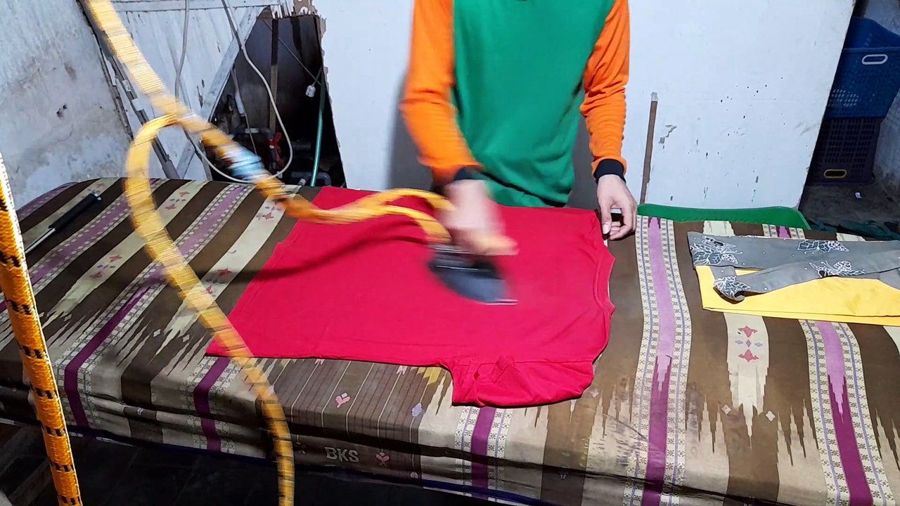 process of ironing clothes - LAUNDRY