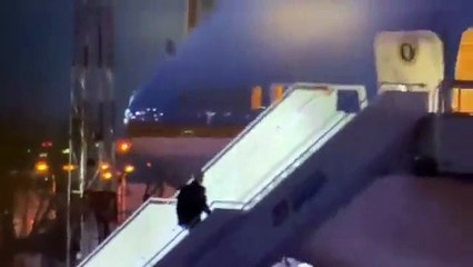 Joe Biden falls up the stairs of Air Force One