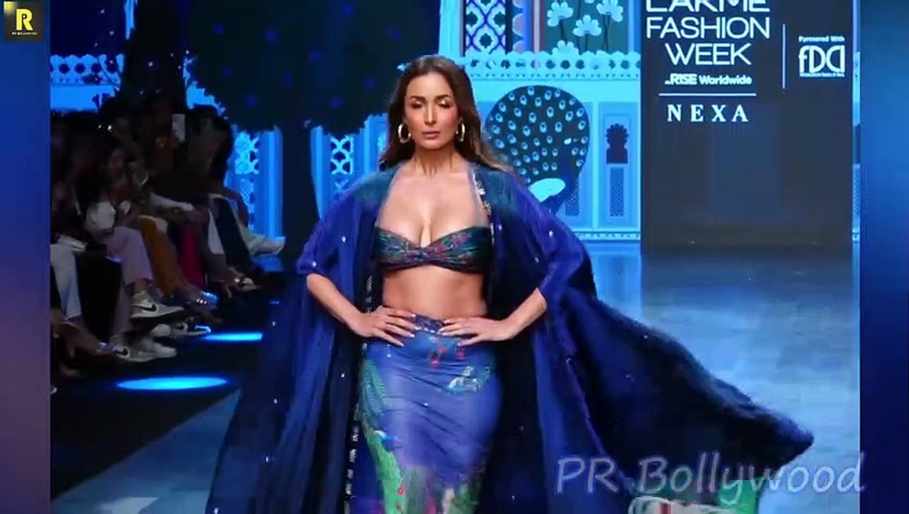 Getting Bigger!  Malaika Arora gaining weight to enhance Huge figure, spotted in tight Dress