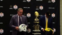 Coaches Sonny Dykes and Jim Harbaugh Pose with the Fiesta Bowl Trophy