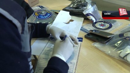 Hatay'da enkazlarda bulunan telefon, tablet ve bilgisayarlar polis gözetiminde korunuyor