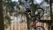 Mountain biking fail, guy has to jump off the mountain bike after it gets stuck mid stunt