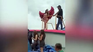Model is pelted with EGGS at festival in Mexico