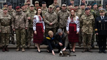 Ukrainian ambassador plays with Larry the cat outside 10 Downing Street